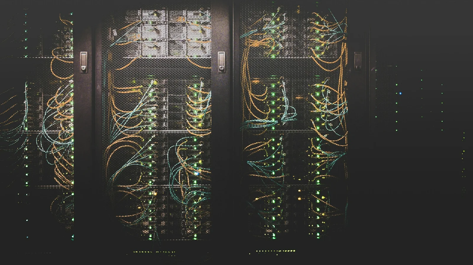Blue-lit server racks in a modern data center